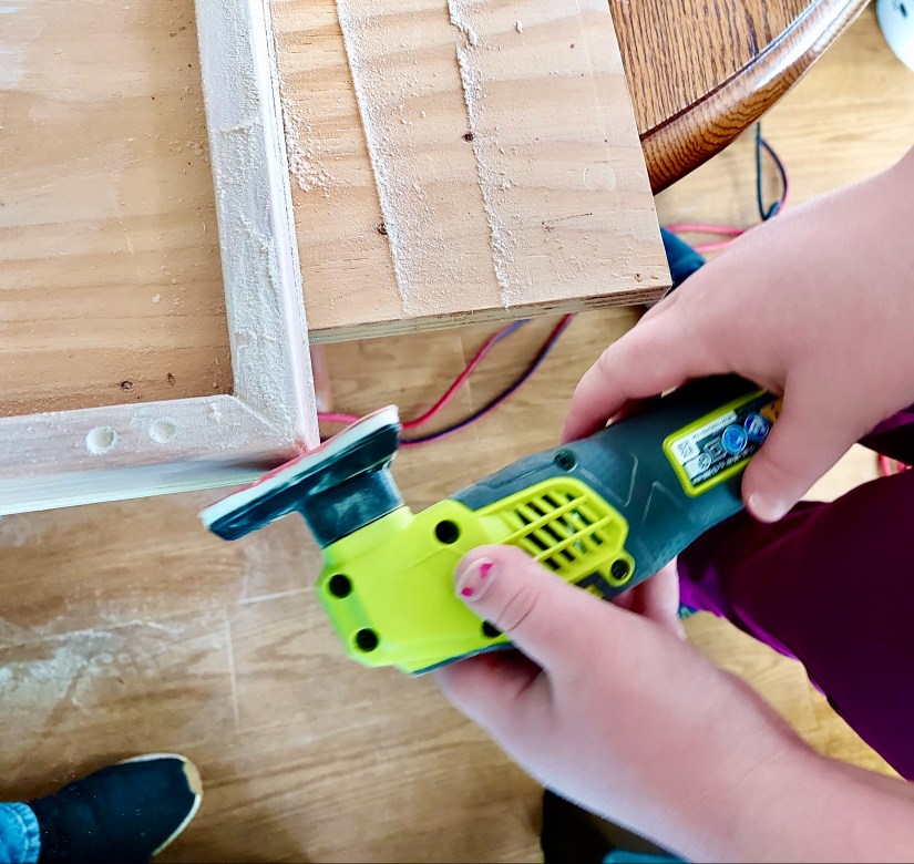 Portia Po Chapman Artist Making Canvas Stretcher Sanding Frame Belleville Ontario Canada