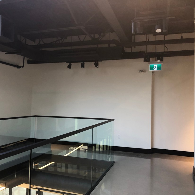 Interior wall site visit at Strong Enterprises Headquarters second floor before custom mural installation in Belleville, Ontario.